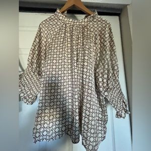 Lovely, feels like silk shirt. Cute for the offfice. Never worn!